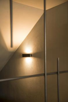 OSSA 180, Wandleuchte, QT-DE12, oval, up/down, schwarz, L/B/H 18/8/7 cm, max. 100 W